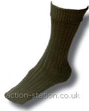Colour: Olive or Black-Sizes: One size fits UK 6-11 -Fibre Content: 65% Pure New Wool, 35% Nylon - Features: Wool rich for warmth. Strategic cushion sole for comfort, ribbed leg & upper foot, turnover top- Ideal for: Military, Rambling, Adventure